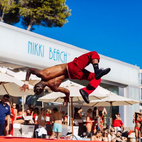 Acrobat performing at Nikki Beach