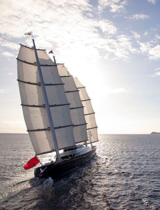 superyacht maltese falcon underway in the Mediterranean while on a luxury yacht charter vacation in peak summer on her way to capri